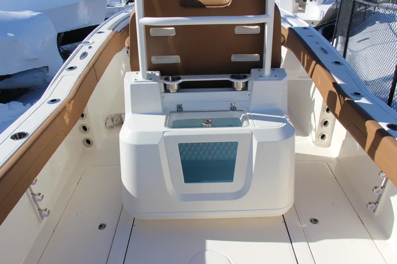  Yacht Photos Pics 2026 Pioneer 270 Pelagic boat interior with seating and storage features.