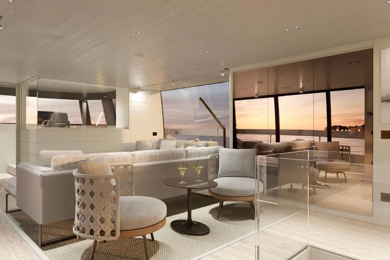  Yacht Photos Pics Luxurious interior of 2026 Sanlorenzo SP92 yacht with elegant seating and ocean view.