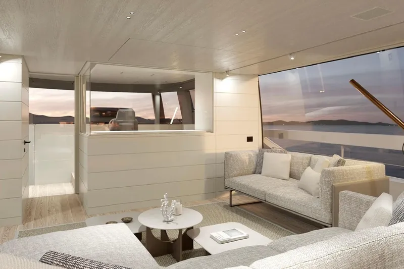  Yacht Photos Pics Luxurious interior of 2026 Sanlorenzo SP92 yacht with modern furnishings and ocean view.