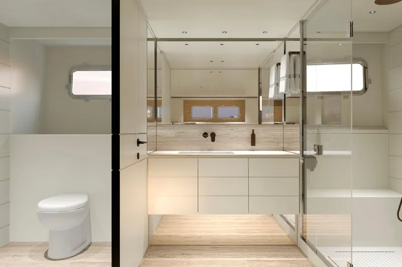  Yacht Photos Pics Luxurious bathroom interior of 2026 Sanlorenzo SP92 yacht with modern fixtures and elegant design.