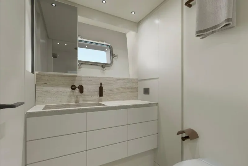  Yacht Photos Pics Modern bathroom interior on 2026 Sanlorenzo SP92 yacht, featuring sleek design and elegant fixtures.