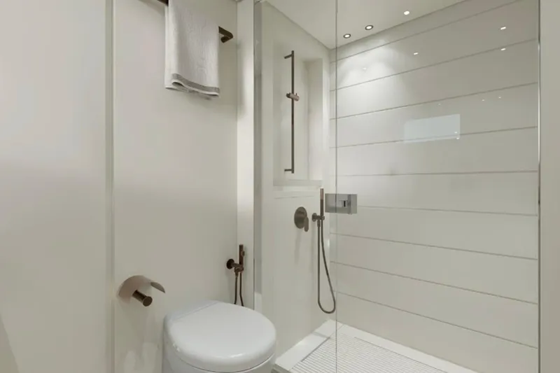  Yacht Photos Pics Modern bathroom in 2026 Sanlorenzo SP92 yacht with glass shower and sleek fixtures.