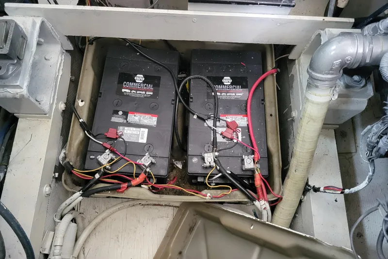 Bout Time Yacht Photos Pics 1979 Bertram 38 Convertible boat battery compartment with wiring and connections.