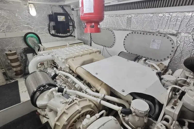  Yacht Photos Pics Engine room of a 2002 Ferretti Yachts 720, showcasing mechanical components.