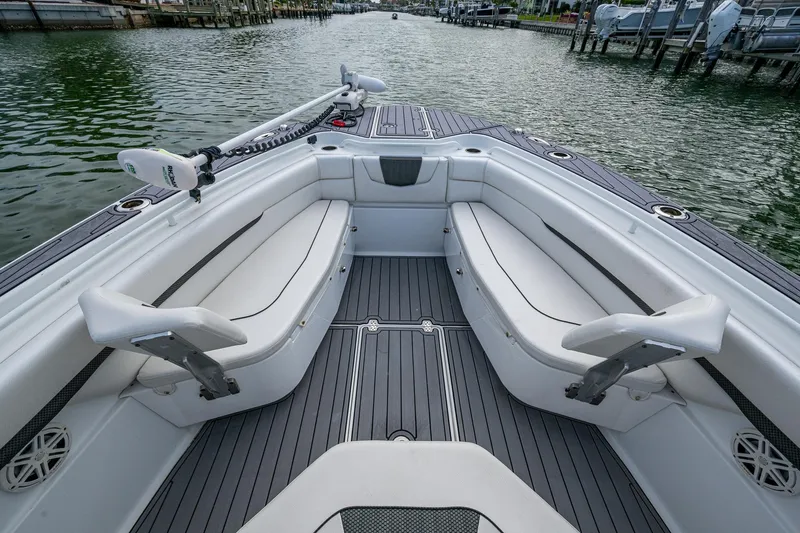  Yacht Photos Pics 2020 Wellcraft 302 Fisherman boat interior with spacious seating and sleek design on the water.