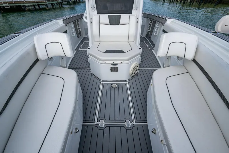  Yacht Photos Pics 2020 Wellcraft 302 Fisherman boat interior with sleek seating and modern design.