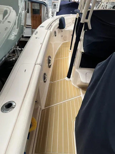  Yacht Photos Pics 2018 Grady-White Canyon 336 boat interior with beige deck and seating.