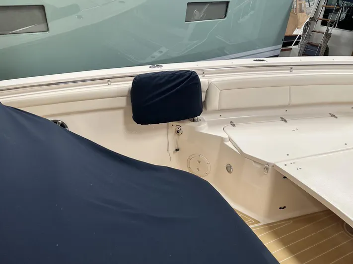  Yacht Photos Pics 2018 Grady-White Canyon 336 boat interior with navy and white seating.