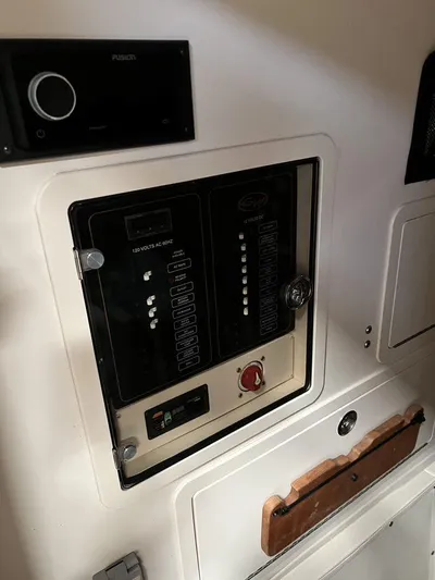  Yacht Photos Pics Control panel inside 2018 Grady-White Canyon 336 boat, featuring switches and dials.