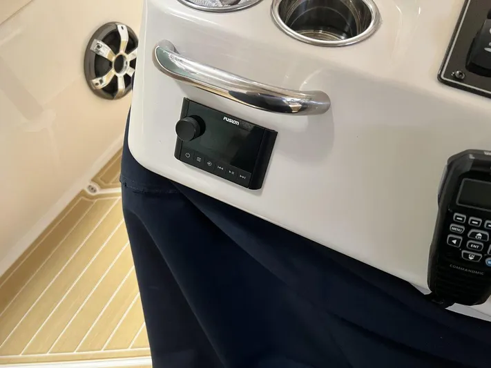  Yacht Photos Pics Control panel of a 2018 Grady-White Canyon 336 boat with audio system and radio.