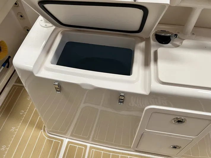  Yacht Photos Pics Open storage compartment on 2018 Grady-White Canyon 336 boat.