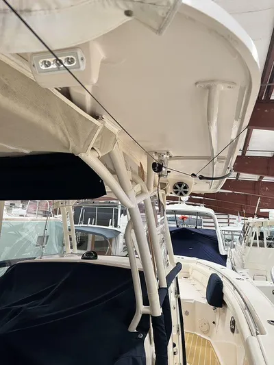  Yacht Photos Pics 2018 Grady-White Canyon 336 boat interior with canopy and seating.