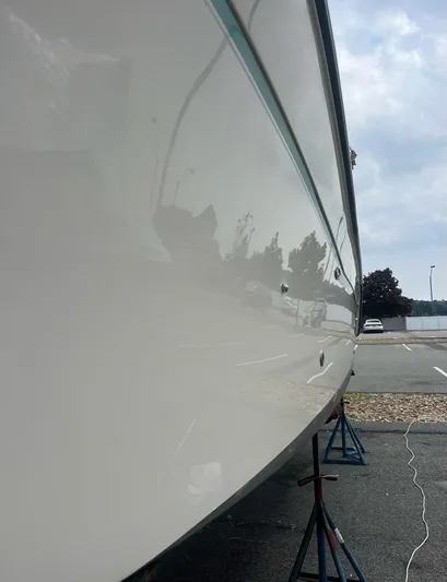  Yacht Photos Pics 2018 Grady-White Canyon 336 boat hull on stands in a parking lot.