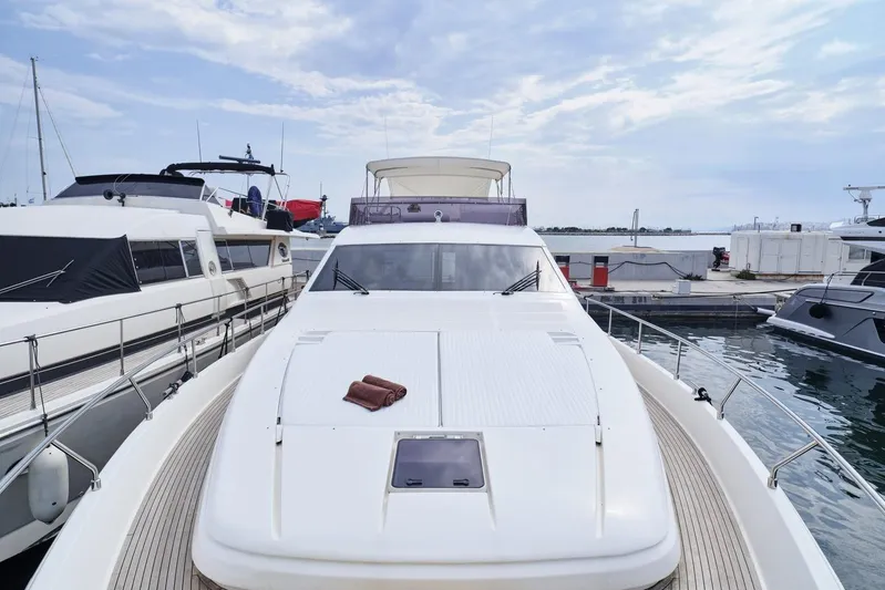 M/y Flow Yacht Photos Pics 2008 Ferretti 681 yacht docked at marina, showcasing sleek design and luxury features.
