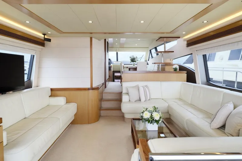 M/y Flow Yacht Photos Pics Luxurious interior of 2008 Ferretti 681 yacht with elegant white seating and modern decor.