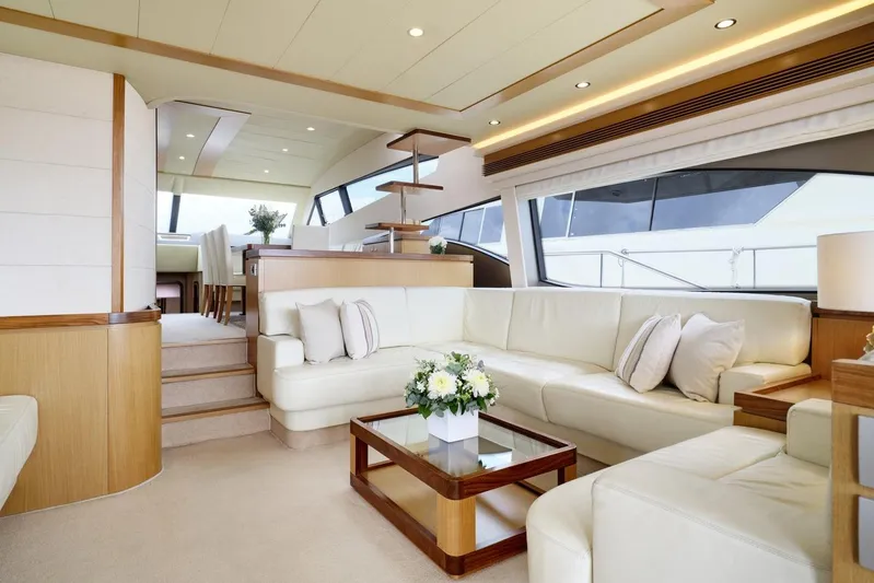 M/y Flow Yacht Photos Pics Luxurious interior of 2008 Ferretti 681 yacht with elegant white seating and modern decor.