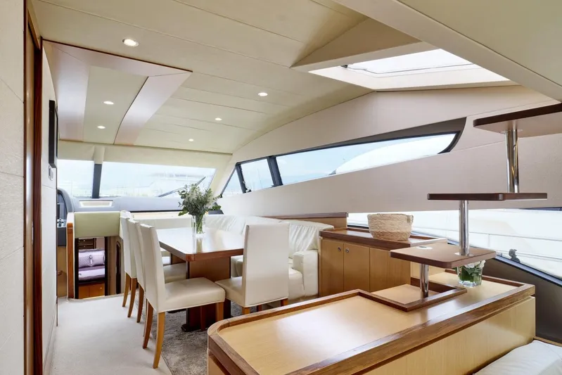 M/y Flow Yacht Photos Pics Luxurious interior of 2008 Ferretti 681 yacht with elegant dining area and modern design.