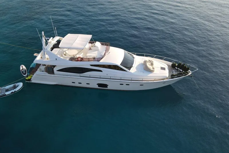 M/y Flow Yacht Photos Pics 2008 Ferretti Yachts 681 anchored in clear blue water, viewed from above.