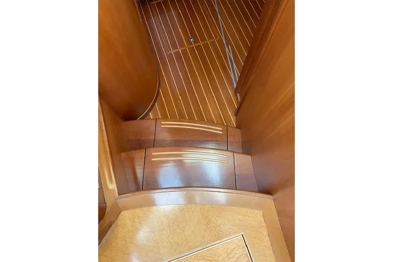  Yacht Photos Pics Wooden interior stairs of a 2010 Sabre 38 Express yacht.