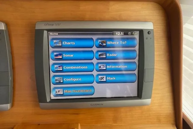  Yacht Photos Pics Garmin marine navigation display on 2010 Sabre 38 Express yacht dashboard.