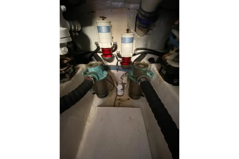  Yacht Photos Pics Engine room of 2010 Sabre 40 Sedan with filters and hoses visible.