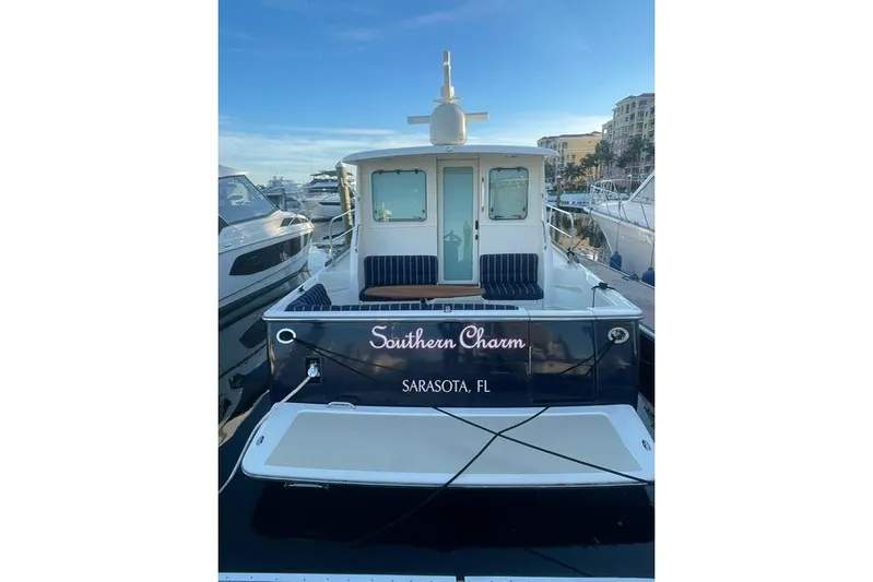  Yacht Photos Pics 2010 Sabre 40 Sedan yacht docked, named "Southern Charm," in Sarasota, FL marina.