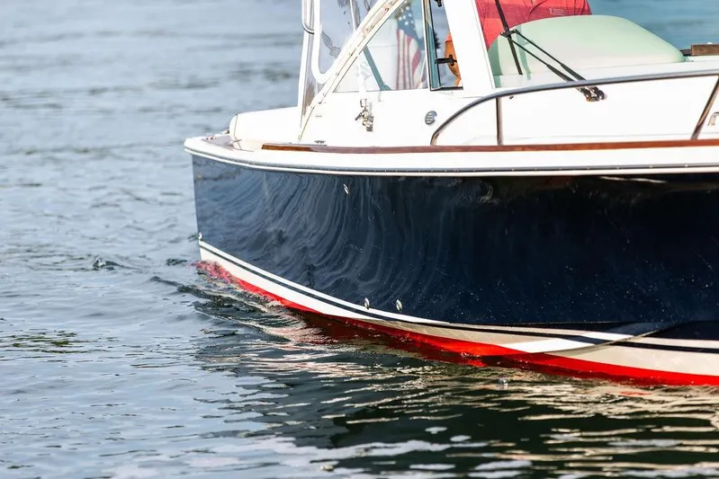 Given To Fly Yacht Photos Pics 2021 Hunt Yachts Harrier 26 cruising on calm water.