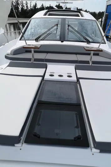  Yacht Photos Pics 2021 Cruisers Yachts 60 Cantius luxury yacht with sleek design and spacious deck.