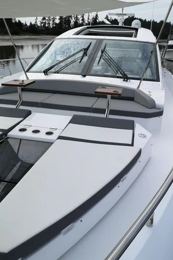  Yacht Photos Pics 2021 Cruisers Yachts 60 Cantius luxury yacht with sleek design and spacious deck.