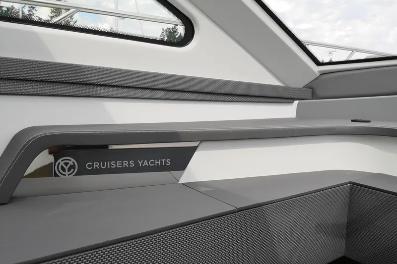  Yacht Photos Pics Interior of 2021 Cruisers Yachts 60 Cantius, featuring sleek seating and modern design elements.