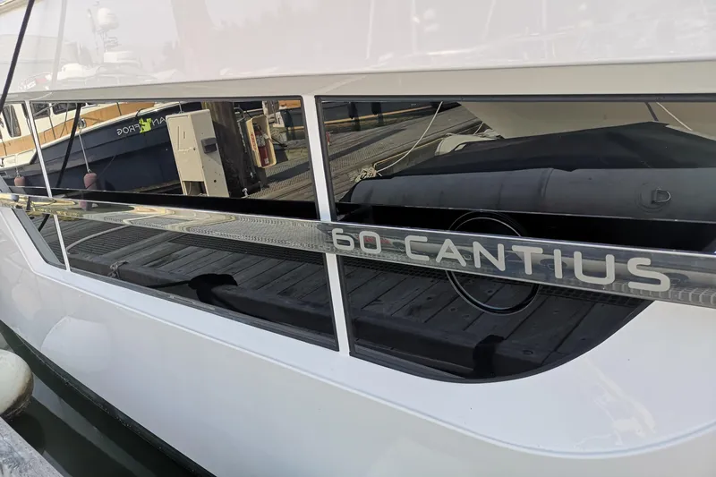  Yacht Photos Pics 2021 Cruisers Yachts 60 Cantius docked, showcasing sleek design and modern features.