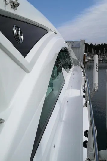  Yacht Photos Pics 2021 Cruisers Yachts 60 Cantius docked, showcasing sleek design and modern features.