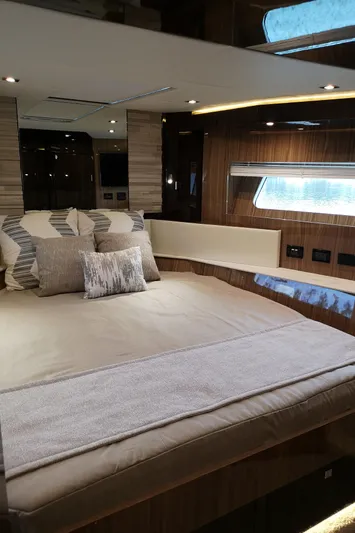  Yacht Photos Pics Luxurious bedroom interior of 2021 Cruisers Yachts 60 Cantius with modern design.