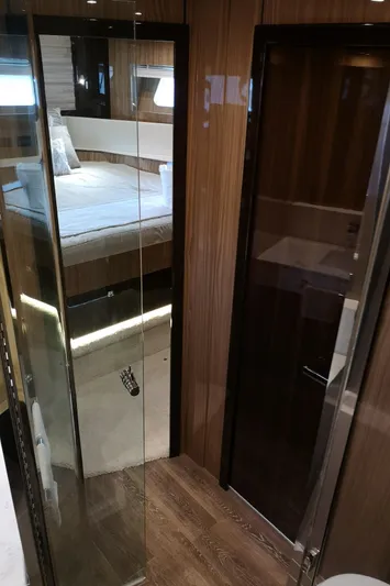  Yacht Photos Pics Interior of 2021 Cruisers Yachts 60 Cantius, featuring a luxurious bedroom and modern design.