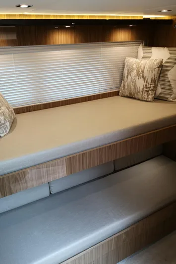  Yacht Photos Pics Interior cabin of 2021 Cruisers Yachts 60 Cantius with modern bedding.