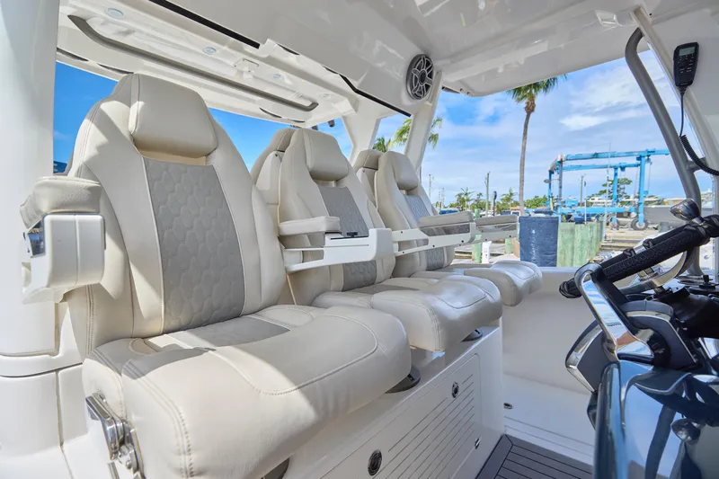 Tropical Moon Yacht Photos Pics Luxurious seating on 2022 Solace 41 CS boat, featuring plush, ergonomic design.