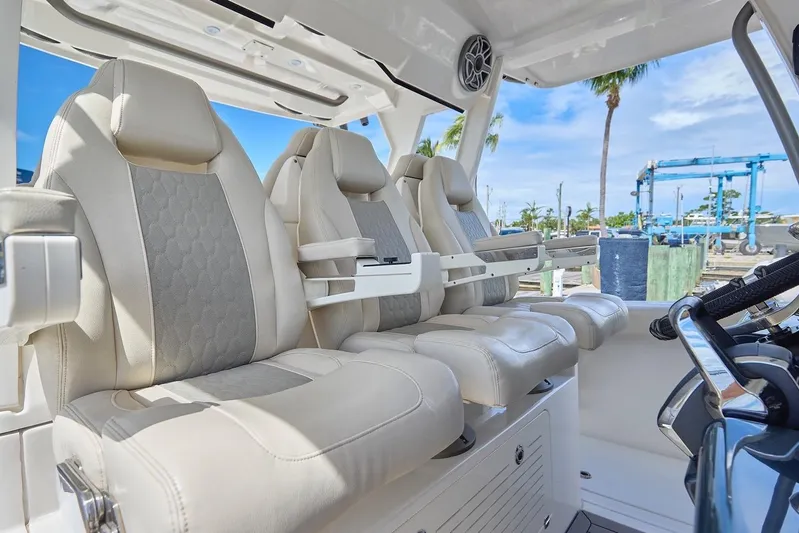 Tropical Moon Yacht Photos Pics Luxurious seating in 2022 Solace 41 CS boat, featuring plush, ergonomic design.