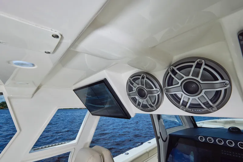 Tropical Moon Yacht Photos Pics Interior of 2022 Solace 41 CS boat featuring speakers and a display screen.