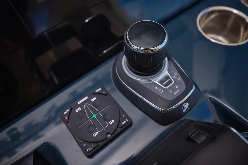 Tropical Moon Yacht Photos Pics Control panel of 2022 Solace 41 CS boat with joystick and buttons.