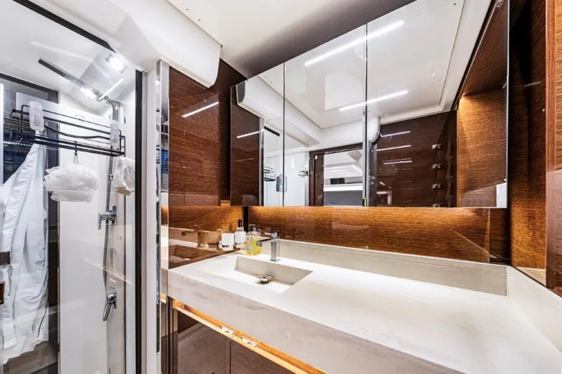 59' 2020 Prestige 590 Flybridge Yacht Photos Pics Luxurious bathroom interior on a 2020 Prestige 590 flybridge yacht, featuring modern fixtures and elegant design.