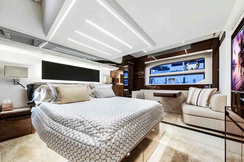 59' 2020 Prestige 590 Flybridge Yacht Photos Pics Luxurious interior of a 2020 Prestige 590 flybridge yacht, featuring a modern bedroom design.
