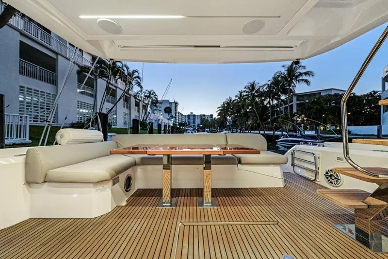 59' 2020 Prestige 590 Flybridge Yacht Photos Pics Luxurious 2020 Prestige 590 flybridge yacht with elegant seating and wooden deck.