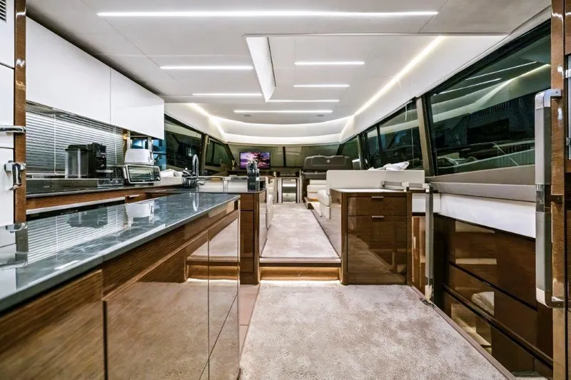 59' 2020 Prestige 590 Flybridge Yacht Photos Pics Luxurious interior of 2020 Prestige 590 flybridge yacht with modern design and sleek finishes.