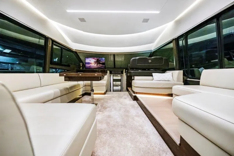 59' 2020 Prestige 590 Flybridge Yacht Photos Pics Luxurious interior of 2020 Prestige 590 flybridge yacht with elegant seating and modern design.