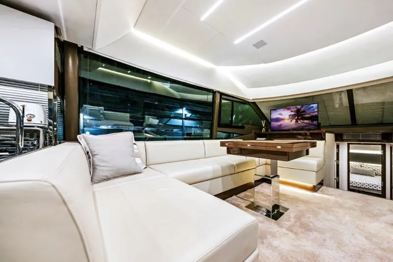59' 2020 Prestige 590 Flybridge Yacht Photos Pics Luxurious interior of 2020 Prestige 590 flybridge yacht with modern seating and elegant decor.
