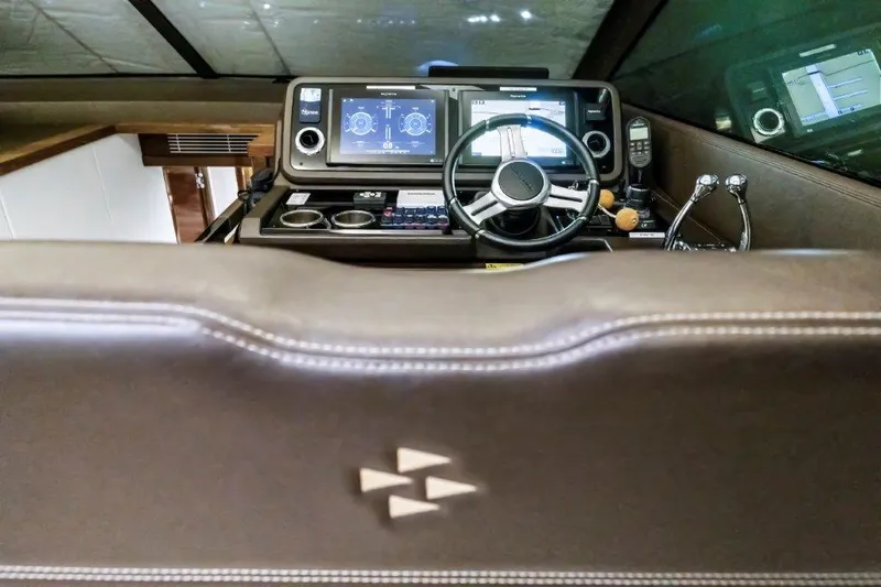 59' 2020 Prestige 590 Flybridge Yacht Photos Pics Prestige 590 flybridge 2020 yacht helm with advanced navigation displays and controls.