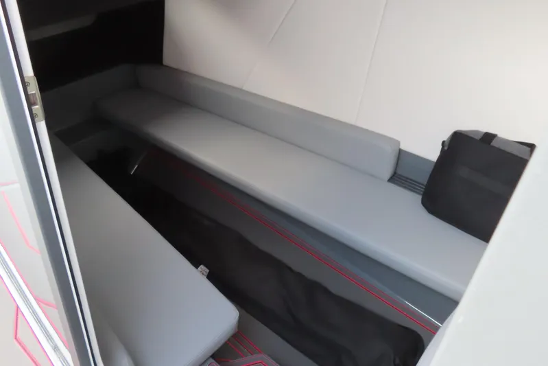  Yacht Photos Pics Interior cabin of 2025 Sunsation 32 CCX boat with gray seating and storage.