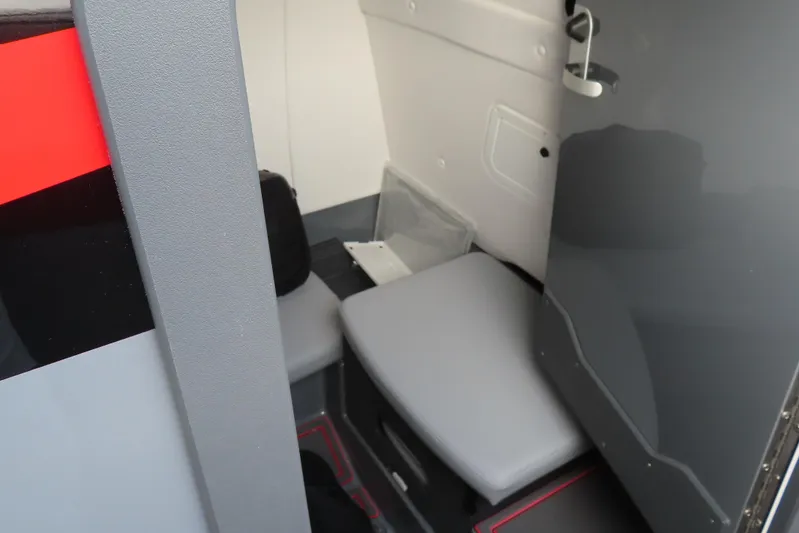  Yacht Photos Pics Interior cabin of 2025 Sunsation 32 CCX boat with seating and storage.