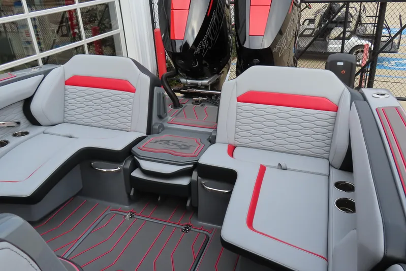  Yacht Photos Pics 2025 Sunsation 32 CCX boat interior with gray and red seating, modern design.