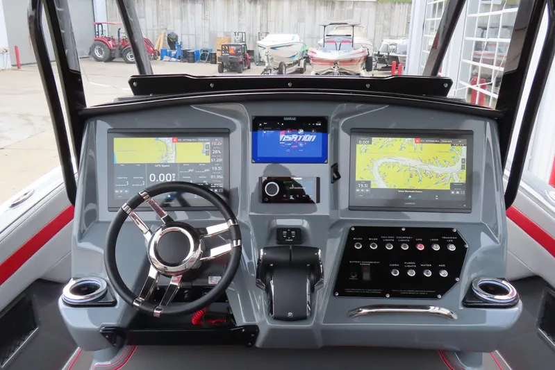  Yacht Photos Pics 2025 Sunsation 32 CCX boat dashboard with advanced navigation displays and controls.